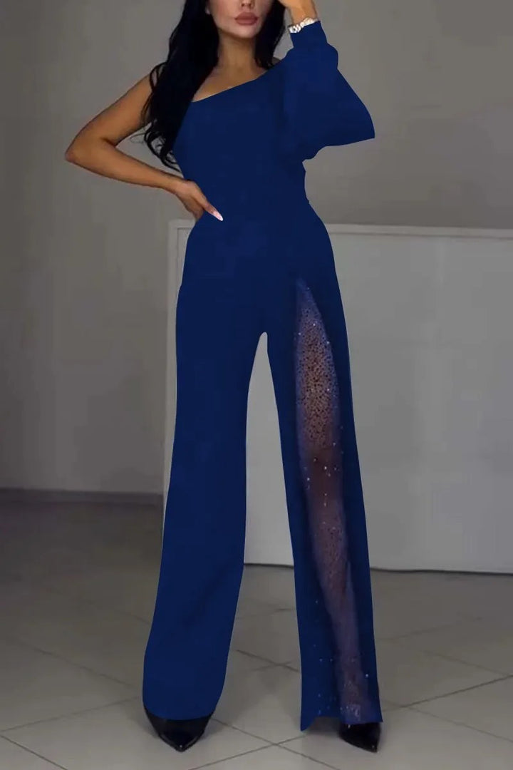 Kvinnors eleganta byxdress med spännande transparenta detaljer Mirla-Eva Jonsson