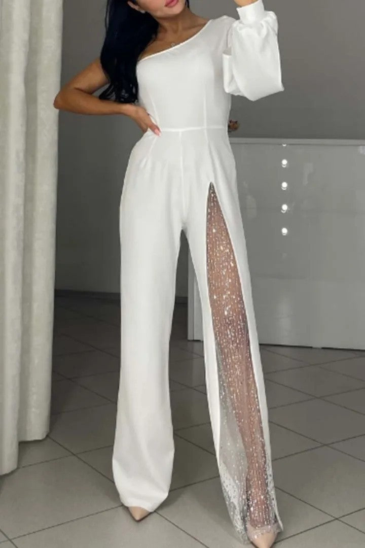 Kvinnors eleganta byxdress med spännande transparenta detaljer Mirla-Eva Jonsson