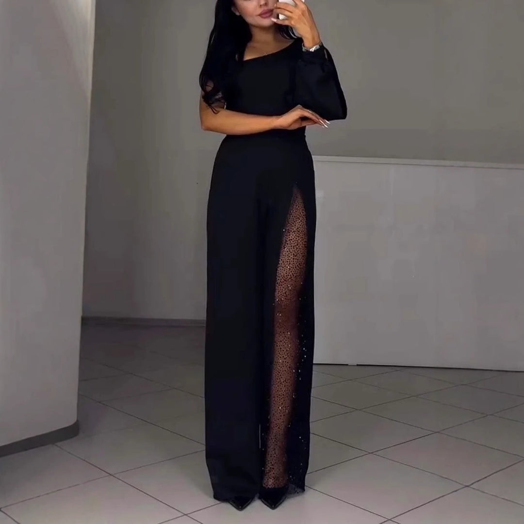 Kvinnors eleganta byxdress med spännande transparenta detaljer Mirla-Eva Jonsson