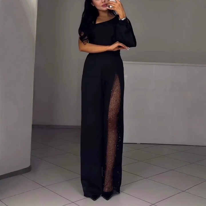 Kvinnors eleganta byxdress med spännande transparenta detaljer Mirla-Eva Jonsson