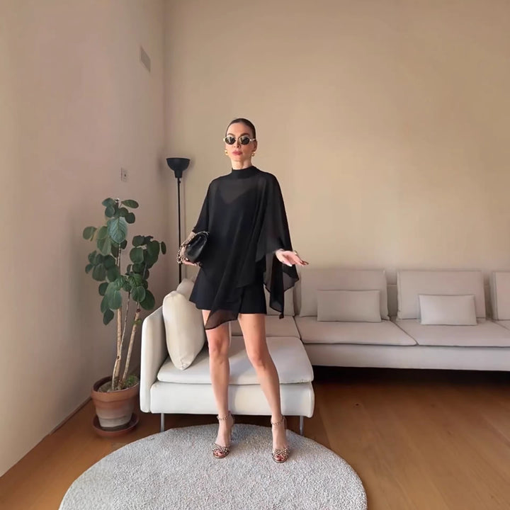 Kvinnors eleganta chiffong tunika med asymmetrisk snitt och flödande design Mirla-Eva Jonsson