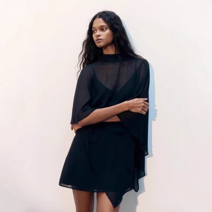 Kvinnors eleganta chiffong tunika med asymmetrisk snitt och flödande design Mirla-Eva Jonsson