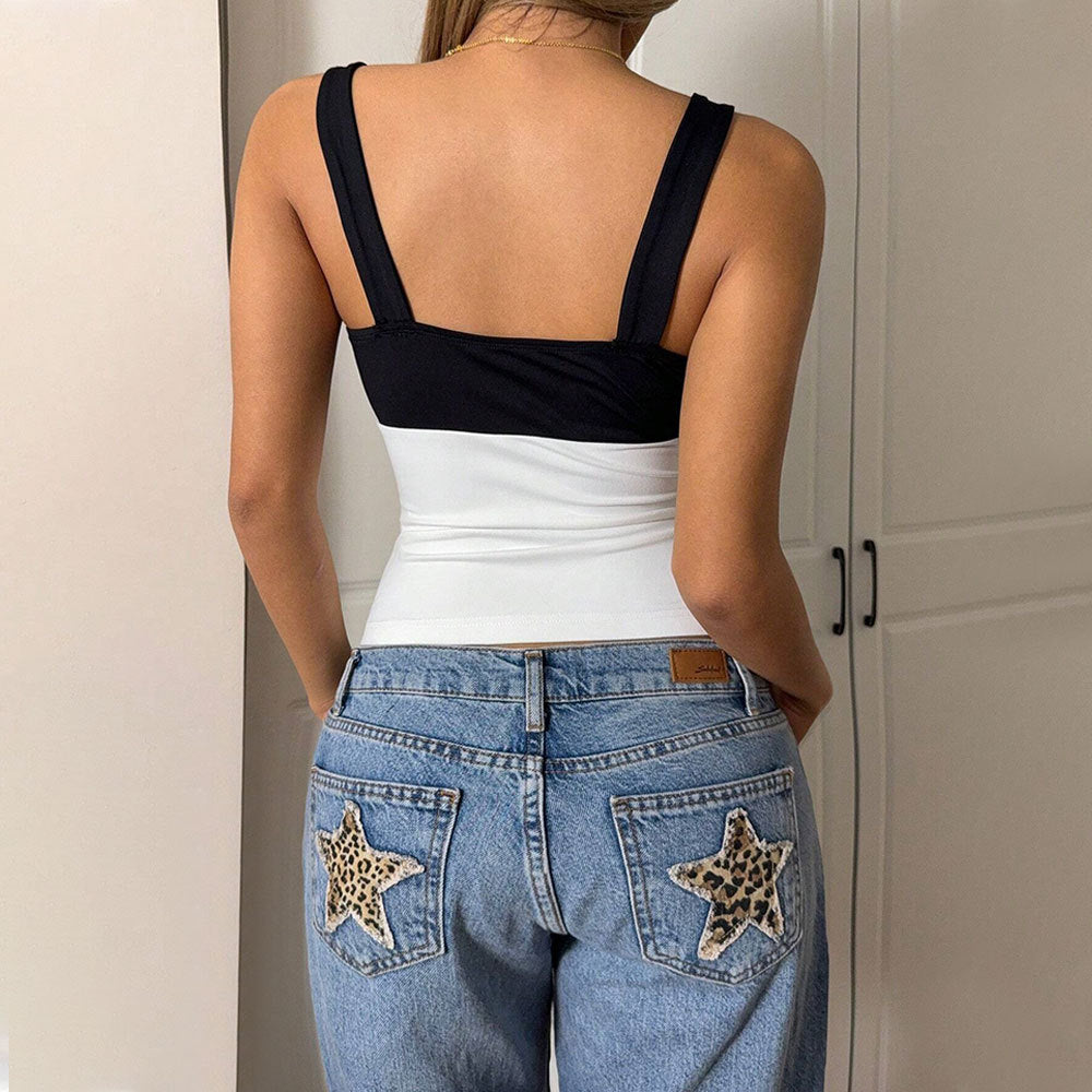 Kvinnors eleganta crop top med asymmetrisk design och kontrasterande färger Mirla-Eva Jonsson