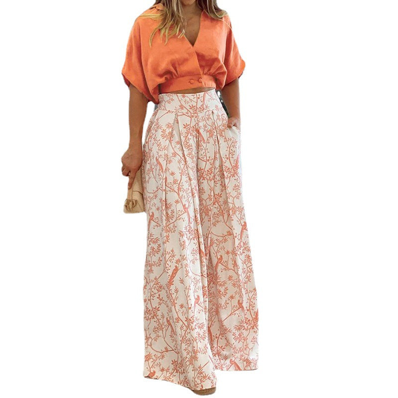 Kvinnors eleganta cropped topp med vida ärmar och höga midjebyxor Mirla-Eva Jonsson