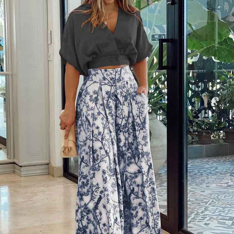 Kvinnors eleganta cropped topp med vida ärmar och höga midjebyxor Mirla-Eva Jonsson