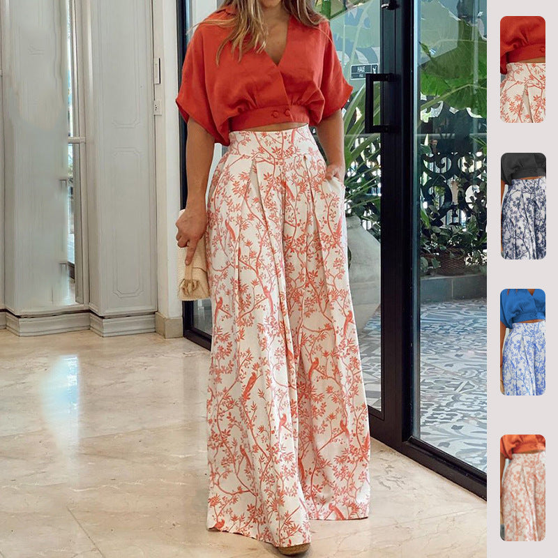 Kvinnors eleganta cropped topp med vida ärmar och höga midjebyxor Mirla-Eva Jonsson