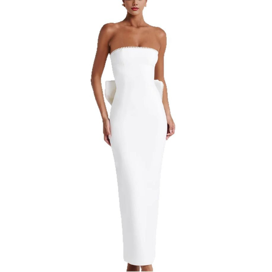 Kvinnors eleganta figurnära maxiklänning med off-the-shoulder-design och trendiga volangdetaljer-Eva Jonsson