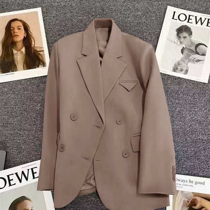 Kvinnors eleganta, figursydda dubbla knäppta blazer med kreativ skärning Mirla-Eva Jonsson