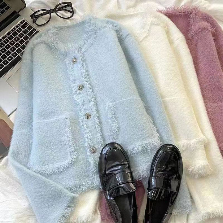 Kvinnors eleganta fleecejacka med modeknappdetaljer Mirla-Eva Jonsson
