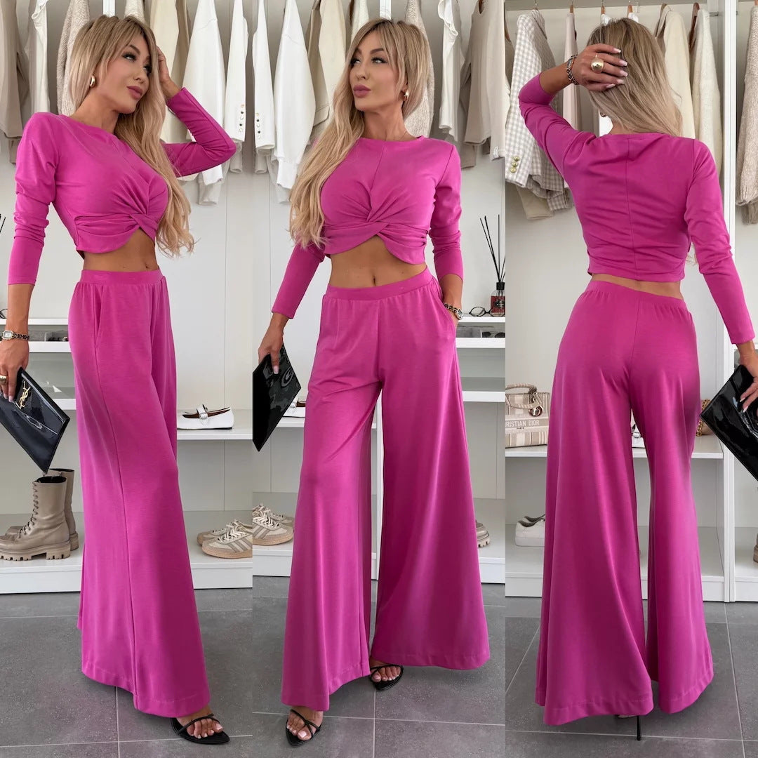 Kvinnors eleganta fritidsset med crop top och vida byxor-Eva Jonsson