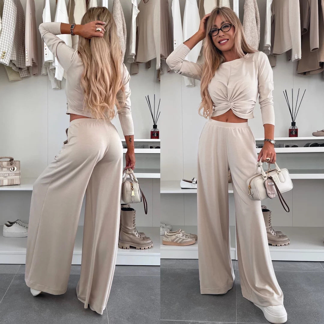 Kvinnors eleganta fritidsset med crop top och vida byxor-Eva Jonsson