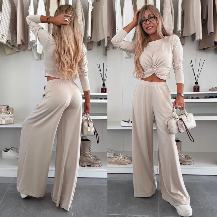 Kvinnors eleganta fritidsset med crop top och vida byxor-Eva Jonsson
