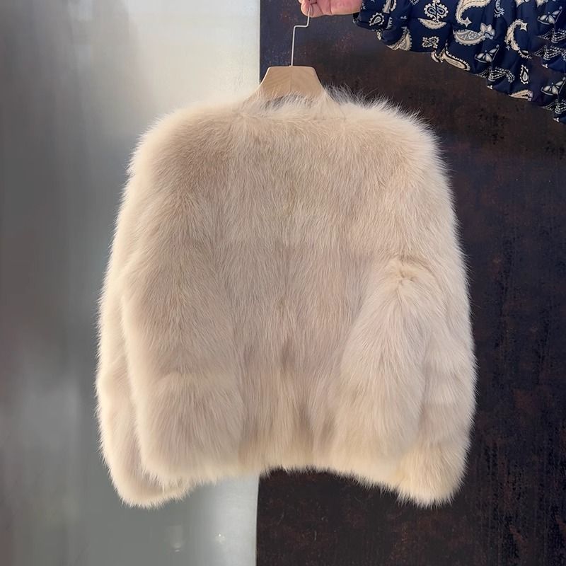 Kvinnors eleganta fuskpälsjacka med kort snitt Mirla-Eva Jonsson