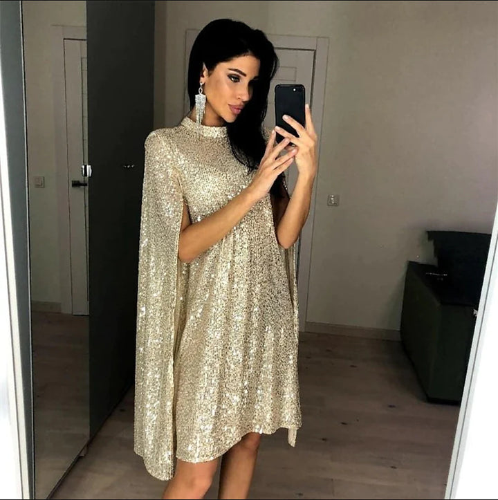 Kvinnors eleganta glittrande kvällsklänning med vid passform och glittrande utseende-Eva Jonsson
