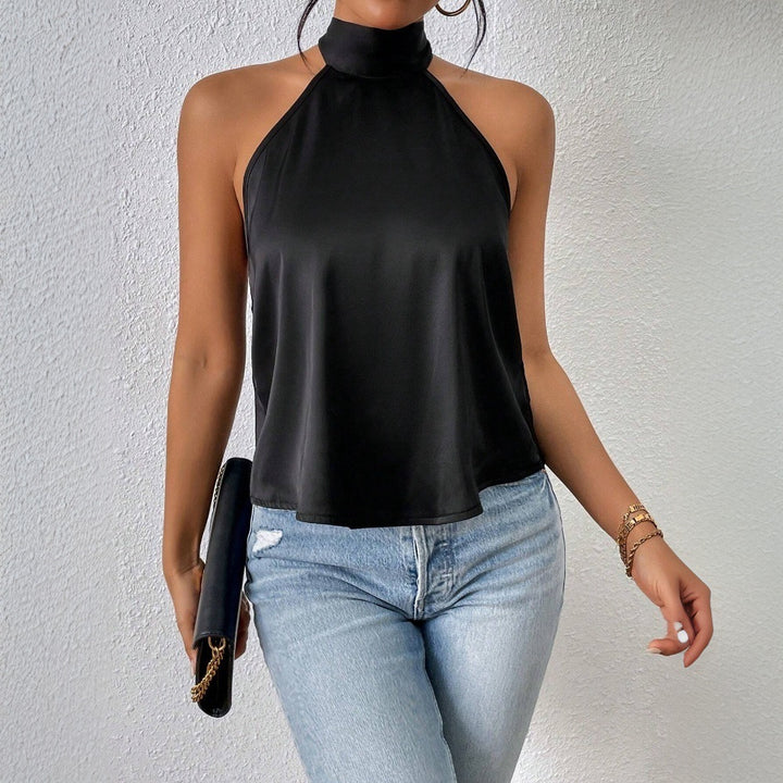 Kvinnors eleganta halterneck-top med silkig finish Mirla-Eva Jonsson