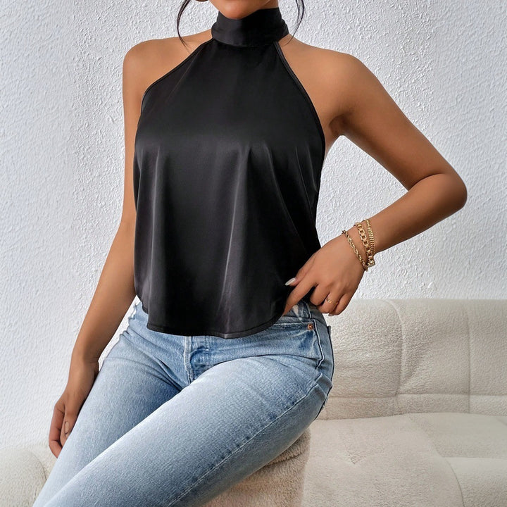 Kvinnors eleganta halterneck-top med silkig finish Mirla-Eva Jonsson