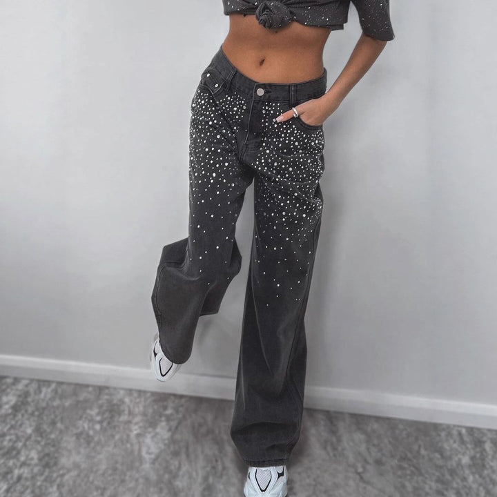 Kvinnors eleganta högmidjade jeans med glittrande detaljer Mirla-Eva Jonsson