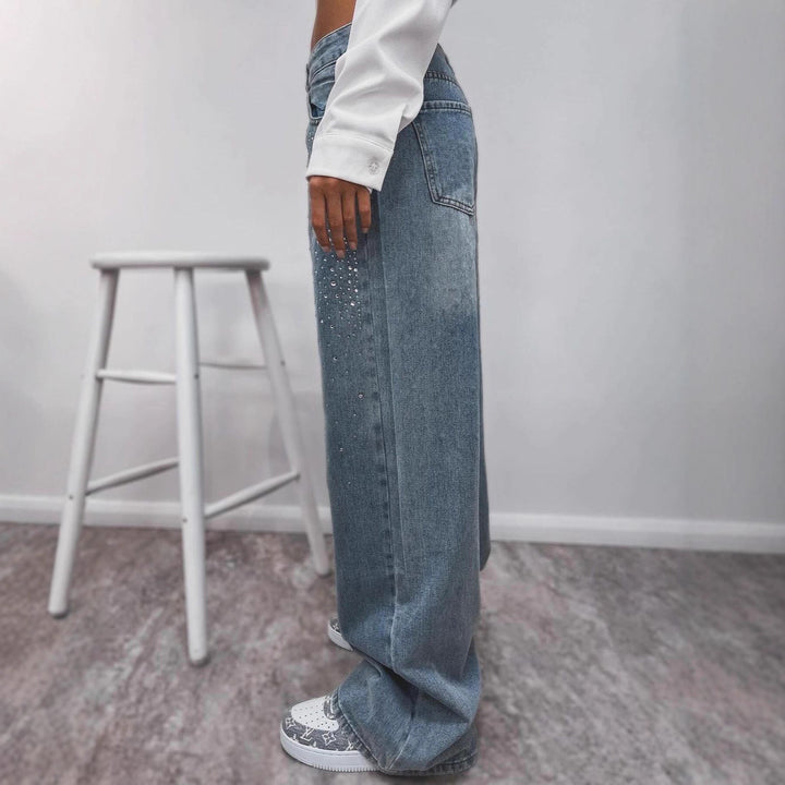 Kvinnors eleganta högmidjade jeans med glittrande detaljer Mirla-Eva Jonsson