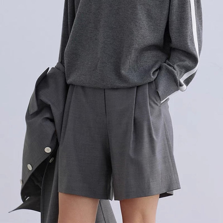 Kvinnors eleganta hotpants med hög midja och praktiska fickor Mirla-Eva Jonsson