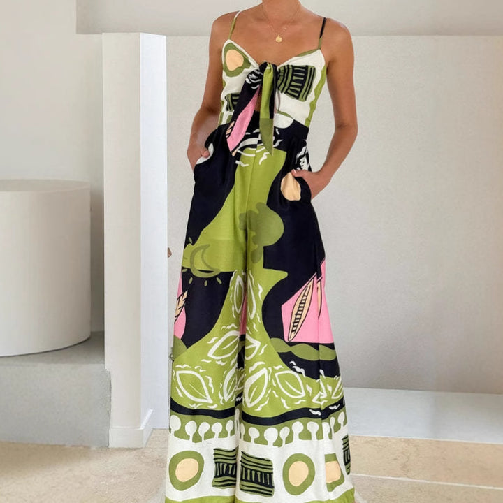 Kvinnors eleganta jumpsuit med lekfullt tie-dye-mönster och sidobandbälte Mirla-Eva Jonsson