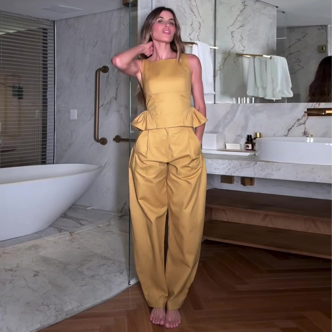 Kvinnors eleganta jumpsuit med peplumdetalj och vida ben Mirla-Eva Jonsson