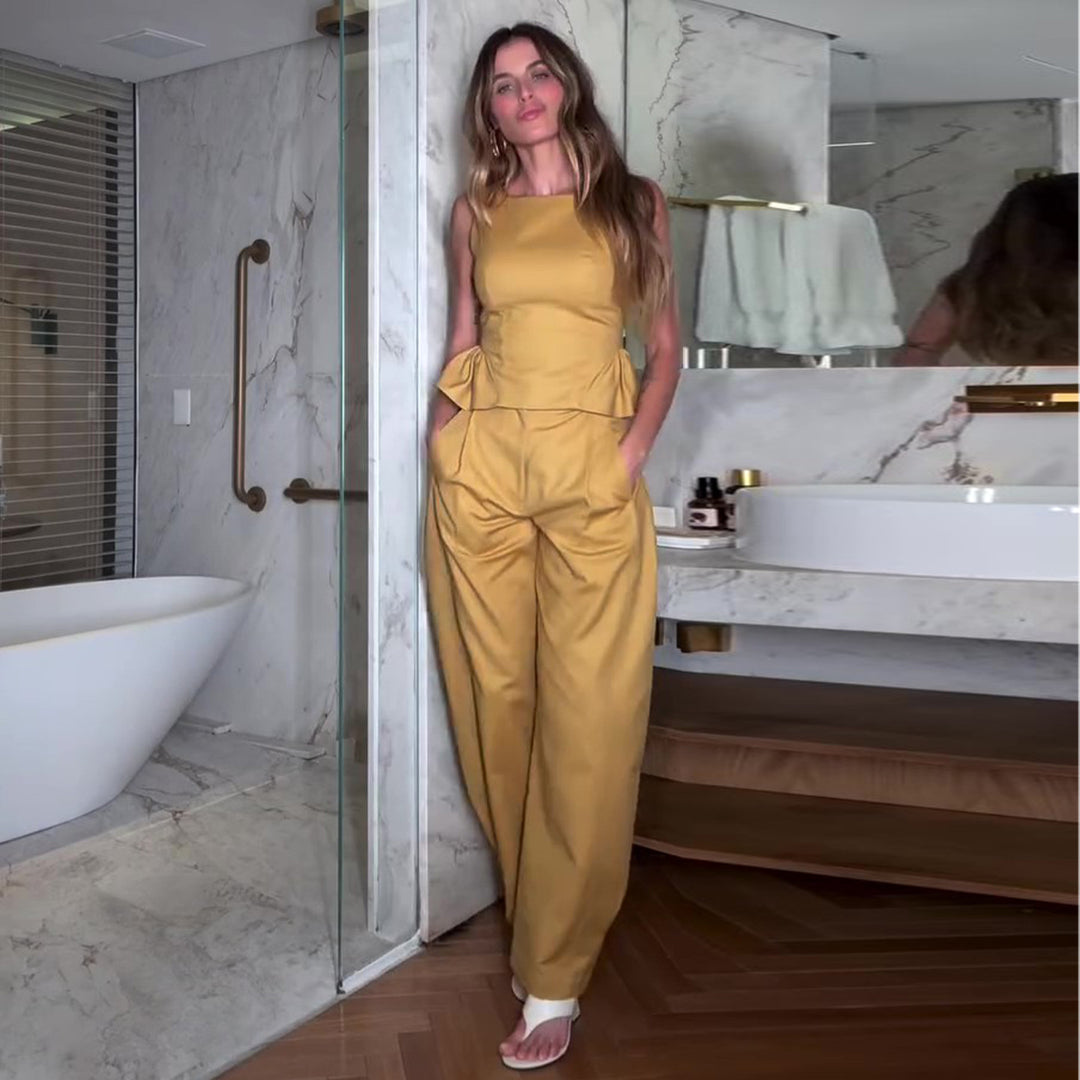 Kvinnors eleganta jumpsuit med peplumdetalj och vida ben Mirla-Eva Jonsson