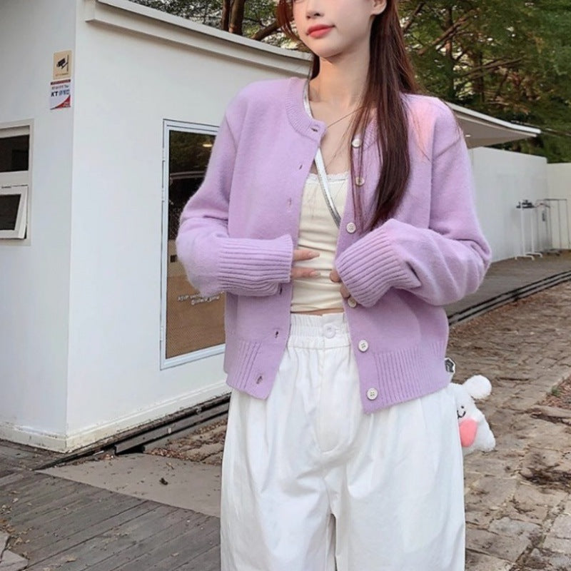 Kvinnors eleganta kortärmad cardigan med knapppdetaljer och fin väv Mirla-Eva Jonsson