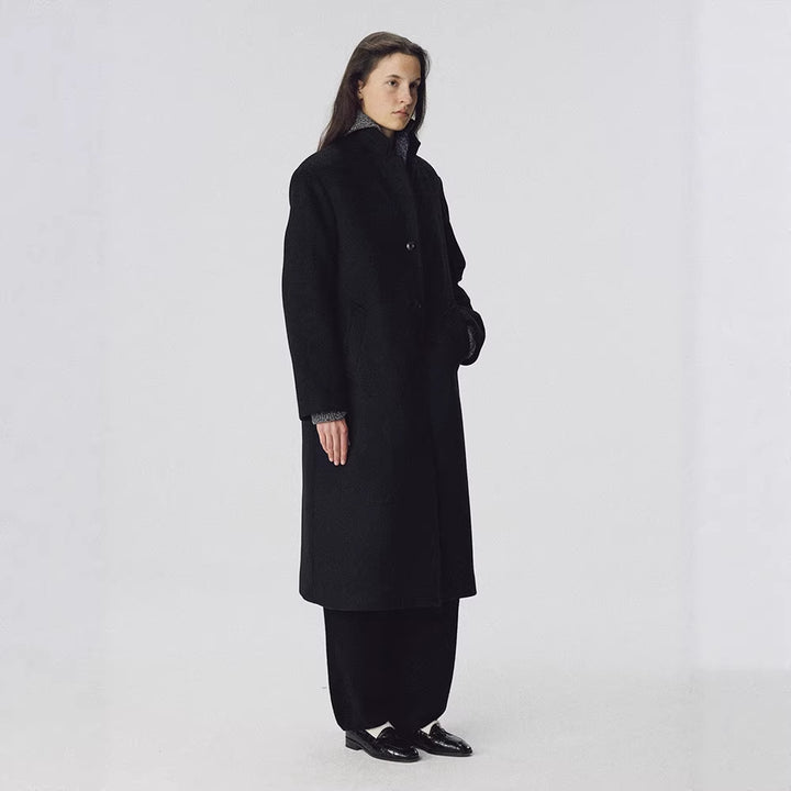 Kvinnors eleganta lång kappa med stiliga slag och fickor Mirla-Eva Jonsson