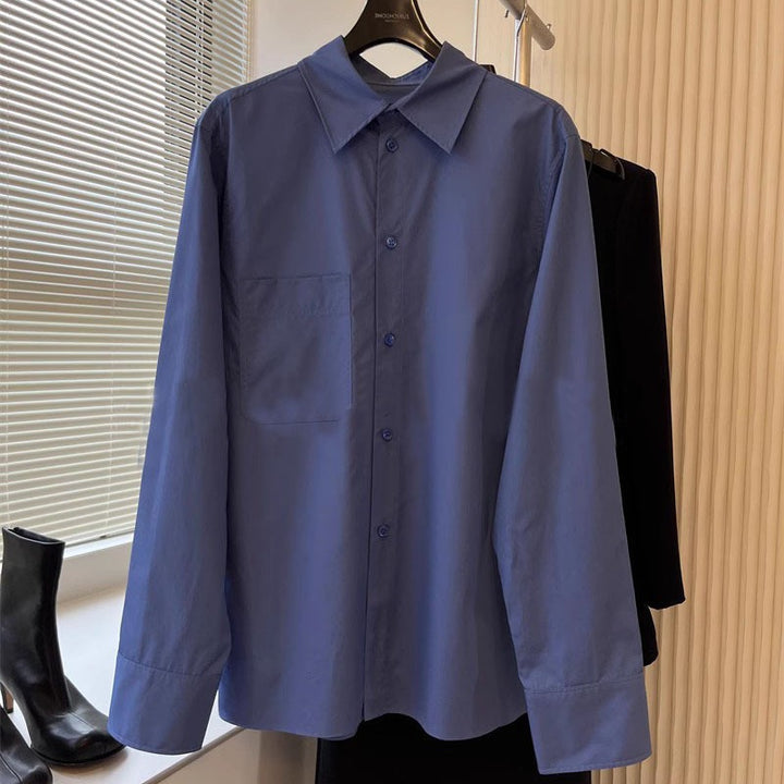 Kvinnors eleganta långärmad blus med knappslå och bröstficka Mirla-Eva Jonsson