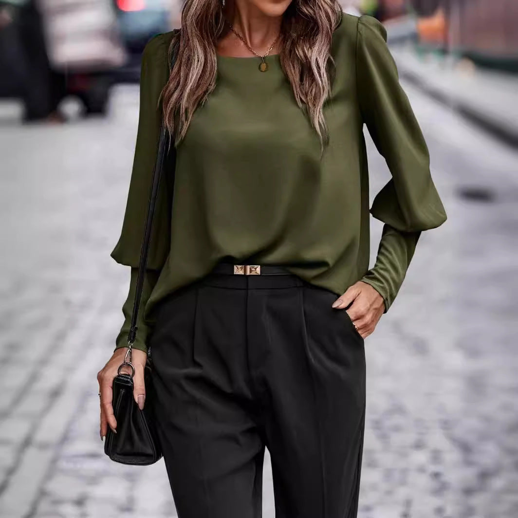 Kvinnors eleganta långärmad topp med fashionabla puffärmar Mirla-Eva Jonsson