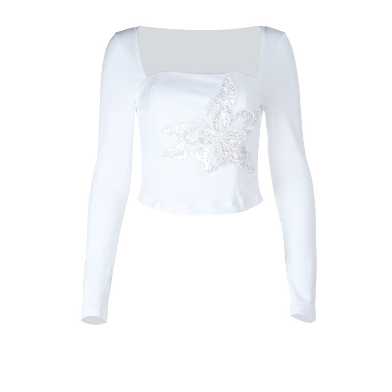 Kvinnors eleganta långärmad topp med floral spetsapplikation Mirla-Eva Jonsson