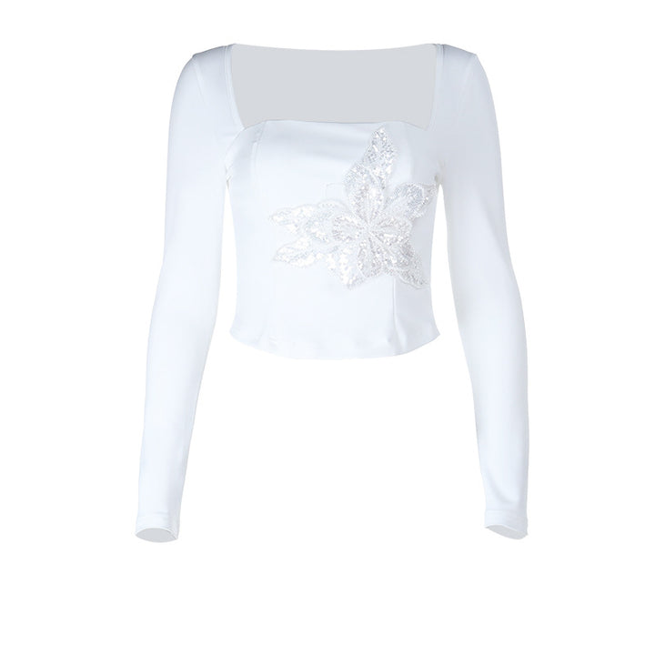 Kvinnors eleganta långärmad topp med floral spetsapplikation Mirla-Eva Jonsson
