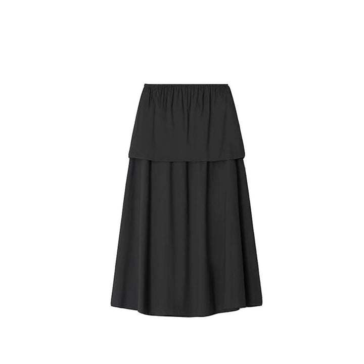 Kvinnors eleganta maxikjol med flödande skärning och elastisk midja Mirla-Eva Jonsson