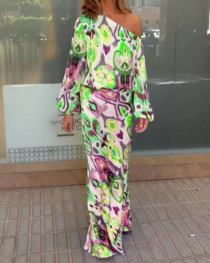 Kvinnors eleganta maxiklänning i asymmetrisk modell med släta ärmar Mirla-Eva Jonsson