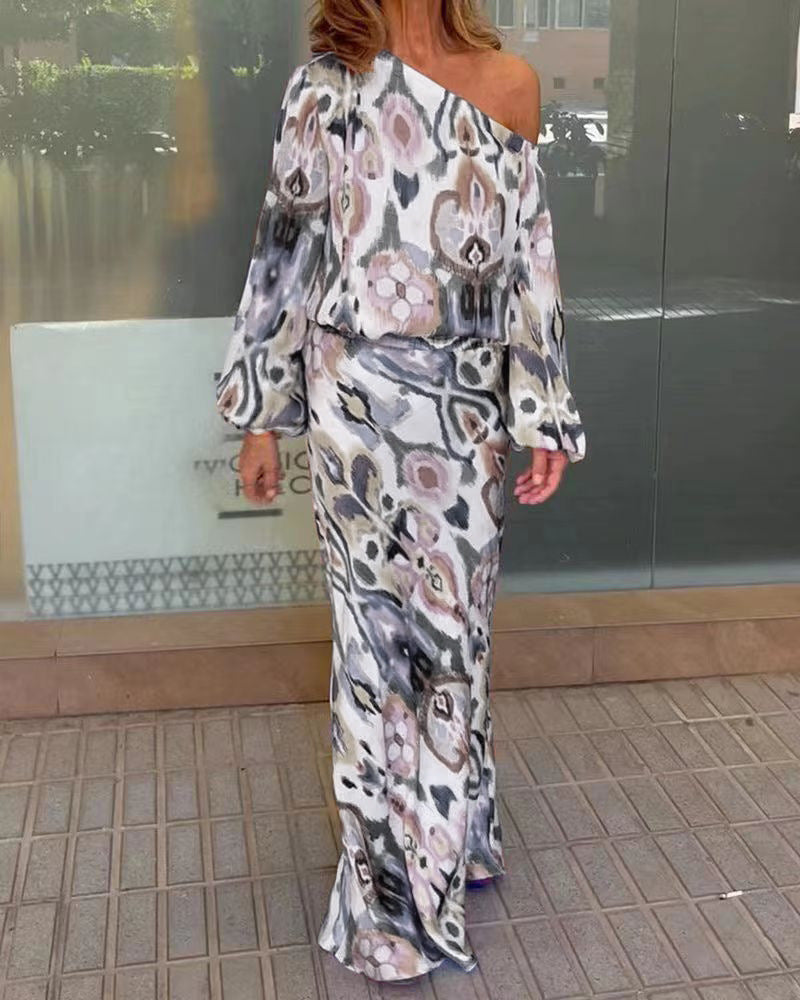 Kvinnors eleganta maxiklänning i asymmetrisk modell med släta ärmar Mirla-Eva Jonsson