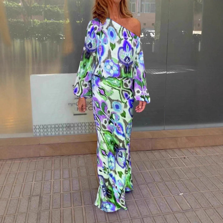 Kvinnors eleganta maxiklänning i asymmetrisk modell med släta ärmar Mirla-Eva Jonsson
