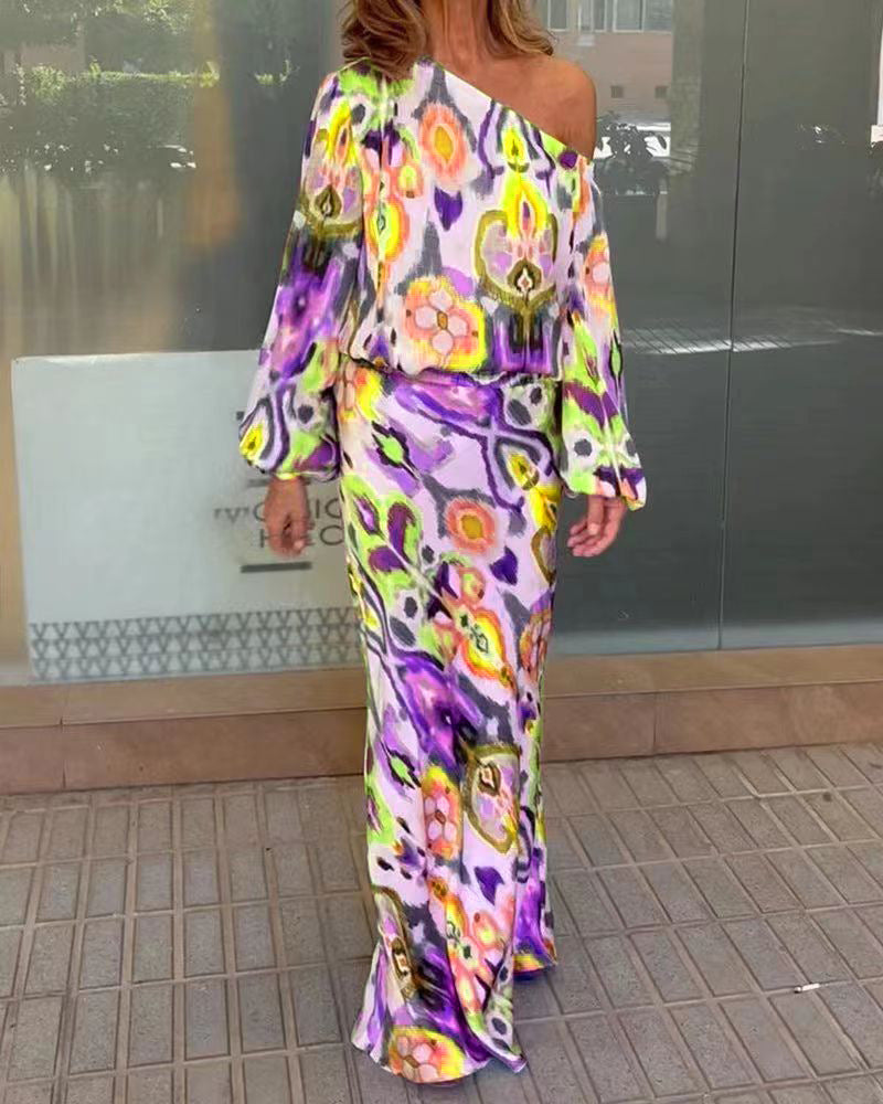 Kvinnors eleganta maxiklänning i asymmetrisk modell med släta ärmar Mirla-Eva Jonsson