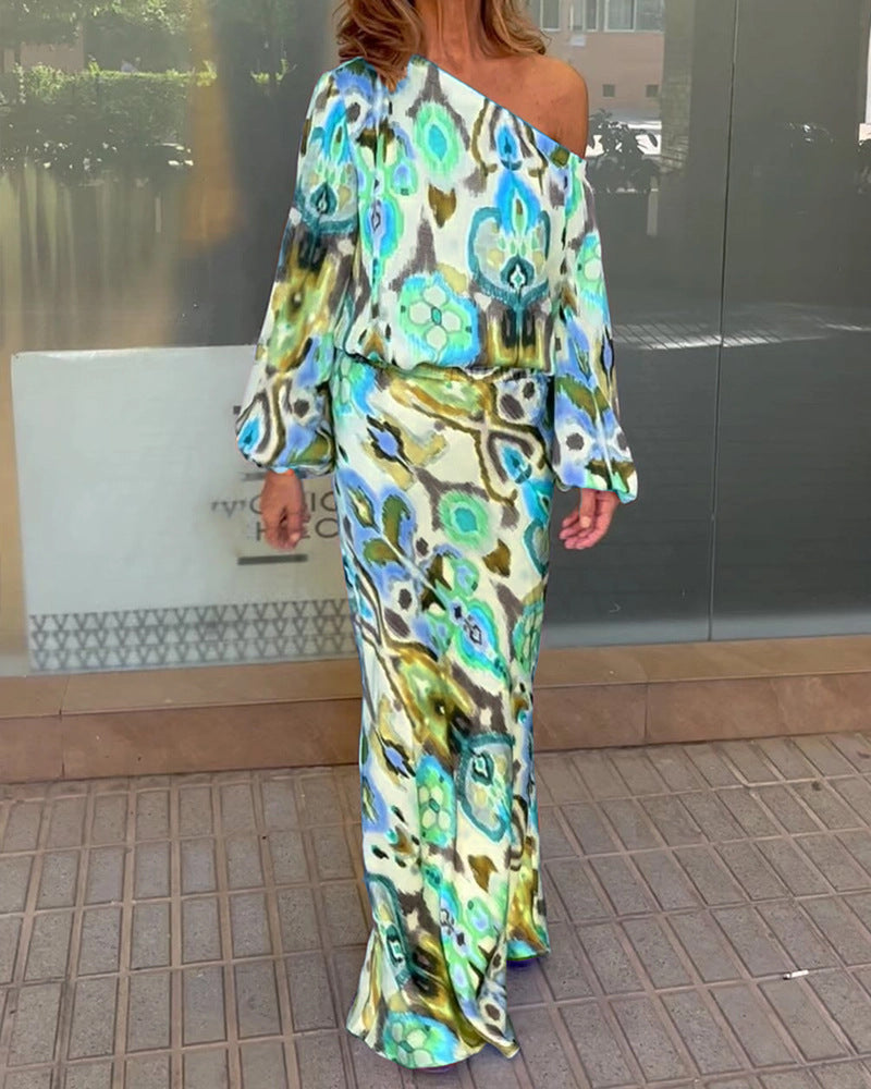 Kvinnors eleganta maxiklänning i asymmetrisk modell med släta ärmar Mirla-Eva Jonsson