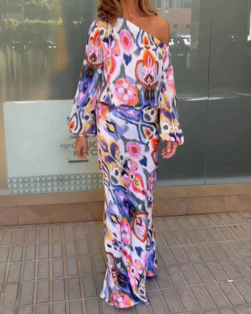 Kvinnors eleganta maxiklänning i asymmetrisk modell med släta ärmar Mirla-Eva Jonsson