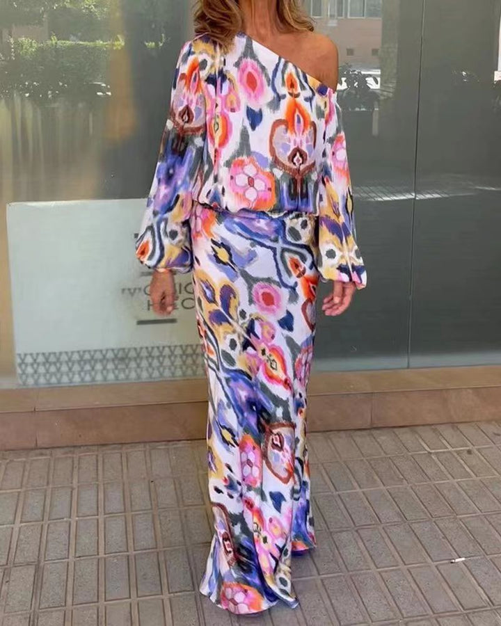 Kvinnors eleganta maxiklänning i asymmetrisk modell med släta ärmar Mirla-Eva Jonsson