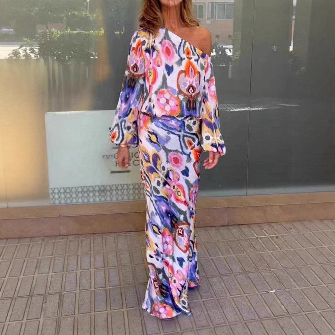 Kvinnors eleganta maxiklänning i asymmetrisk modell med släta ärmar Mirla-Eva Jonsson