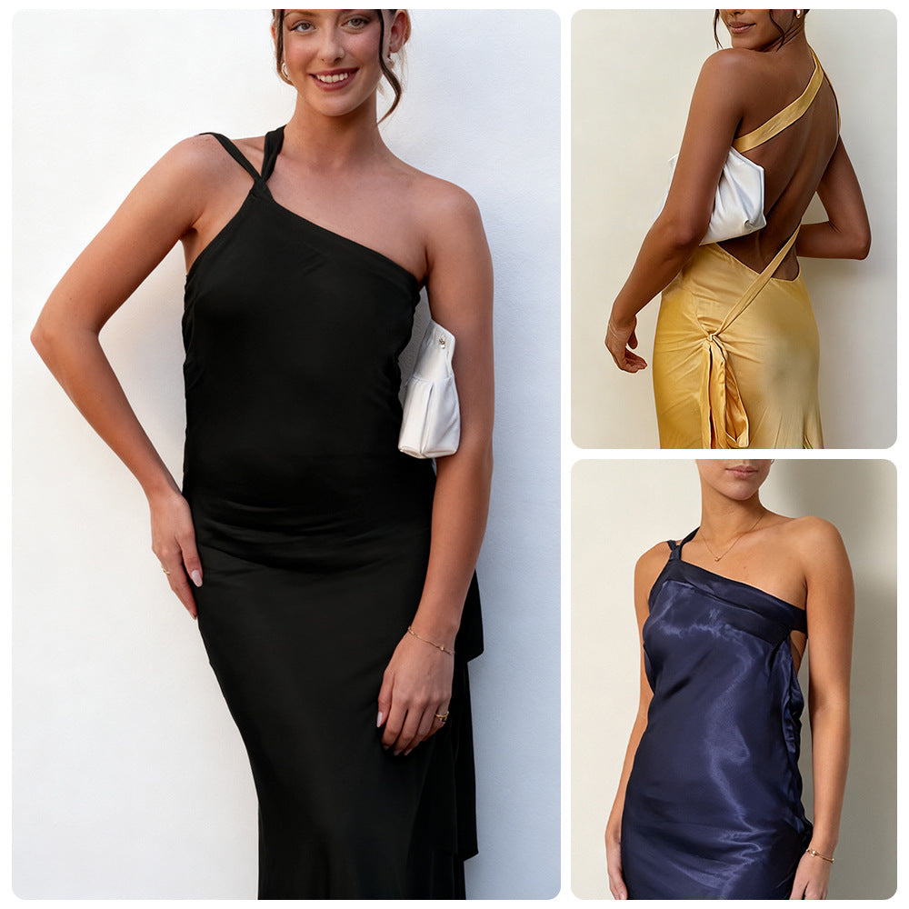 Kvinnors eleganta maxiklänning med asymmetrisk halterdesign och glittrande satin-Eva Jonsson