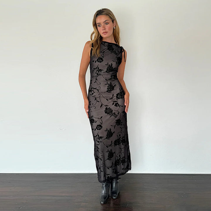 Kvinnors eleganta maxiklänning med blommigt lace-mönster och ärmlös design Mirla-Eva Jonsson