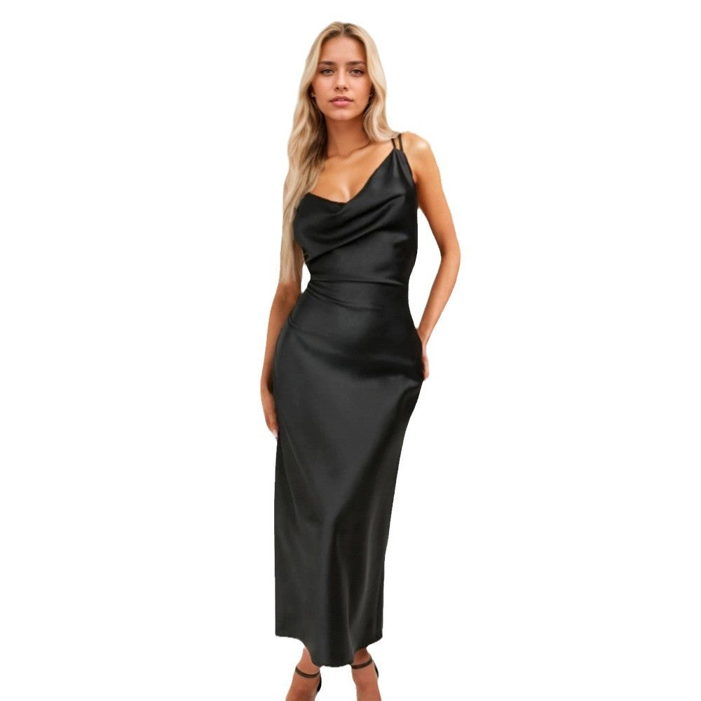 Kvinnors eleganta maxiklänning med draperad båtringning och smal silhuett Mirla-Eva Jonsson