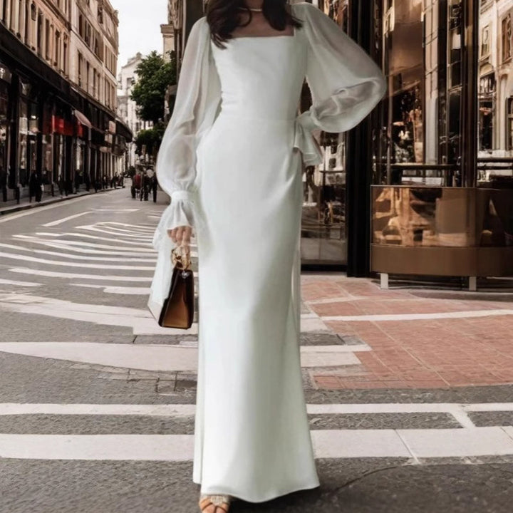 Kvinnors eleganta maxiklänning med puffärmar och fyrkantig halsringning Mirla-Eva Jonsson