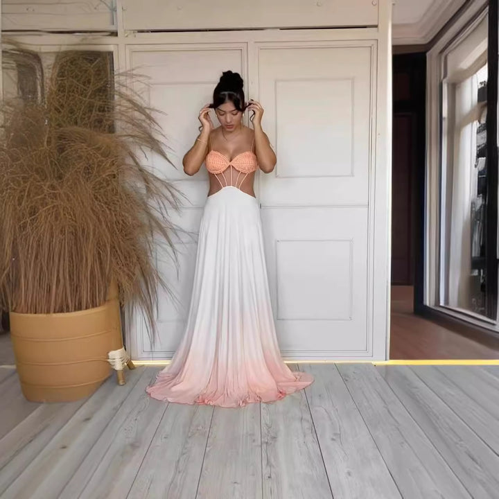 Kvinnors eleganta maxiklänning med snyggt avbrottsdesign och flödande kjol Mirla-Eva Jonsson