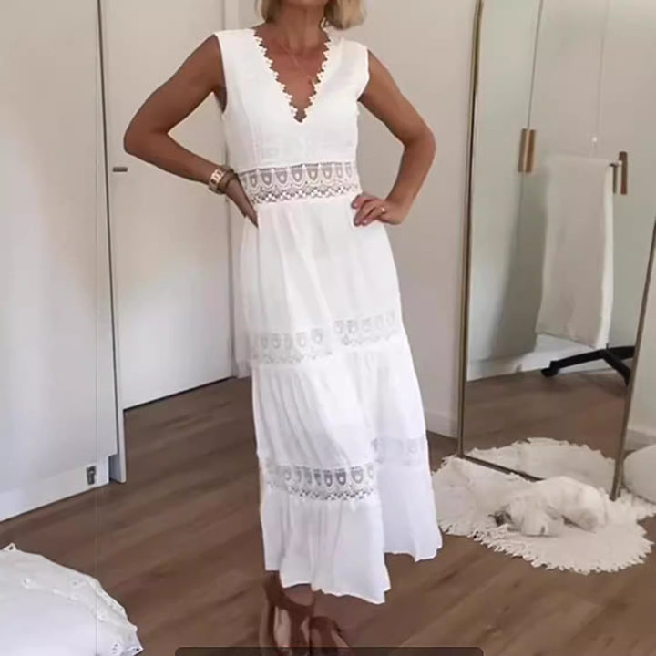 Kvinnors eleganta maxiklänning med spetstillägg och låg ryggdetalj-Eva Jonsson