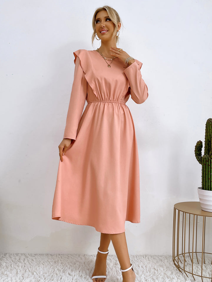 Kvinnors eleganta maxiklänning med volanger och elastisk midja Mirla-Eva Jonsson