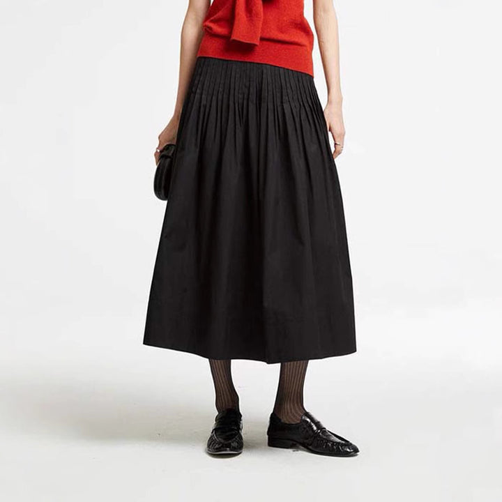Kvinnors eleganta midi kjol med plisserade detaljer Mirla-Eva Jonsson