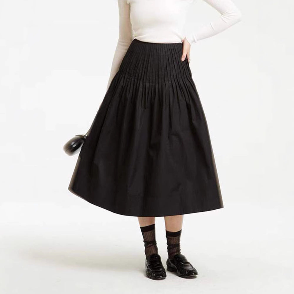 Kvinnors eleganta midi kjol med plisserade detaljer Mirla-Eva Jonsson